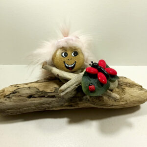 P0RTAFORTUNA realizzato con sassi legni e confetti